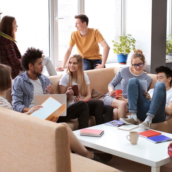 college students chatting in lounge