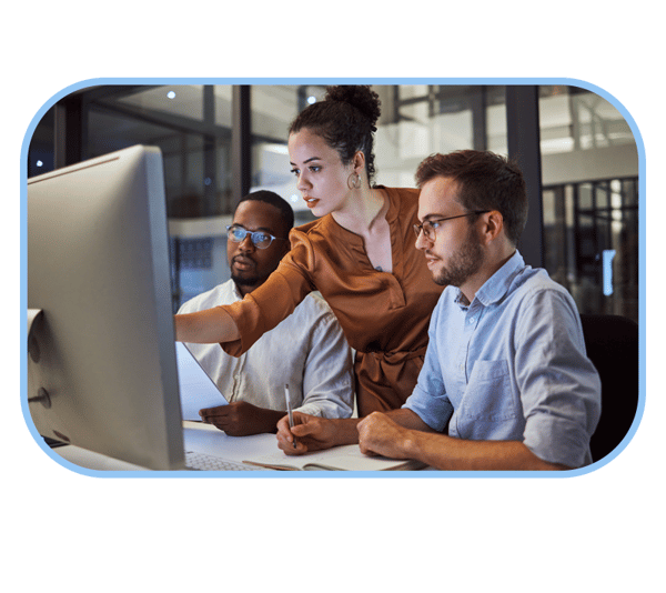 three people using a computer