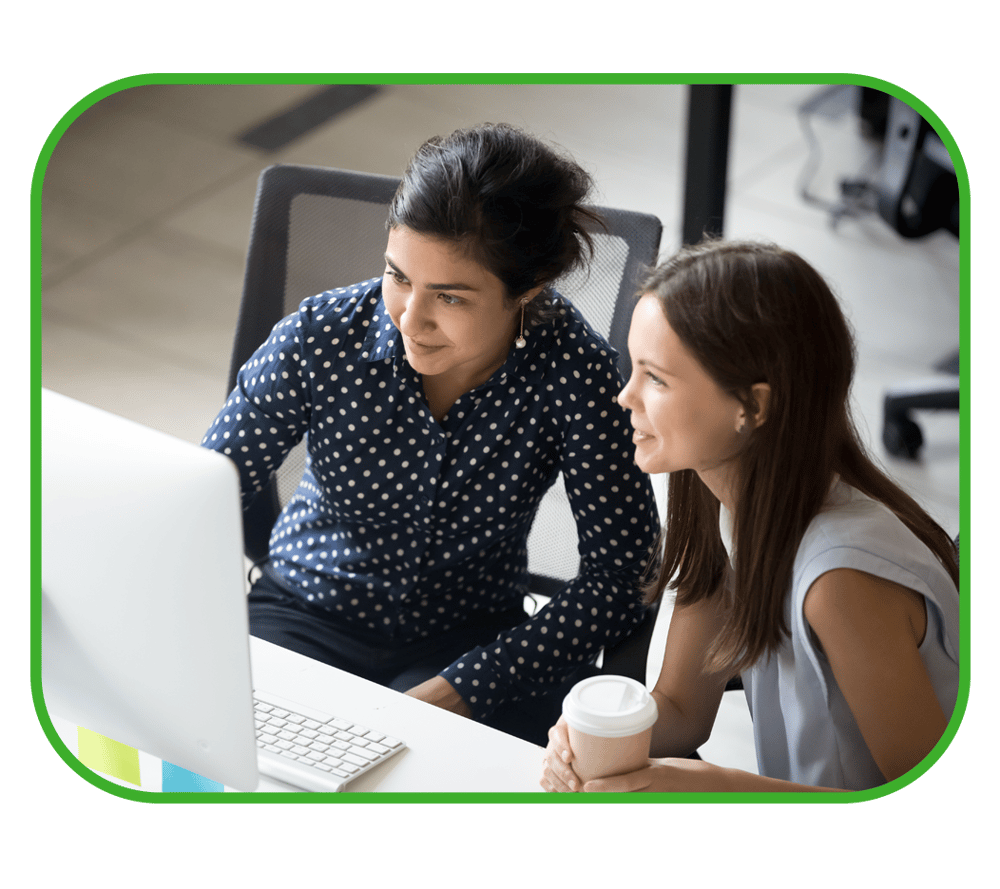 two students looking at computer